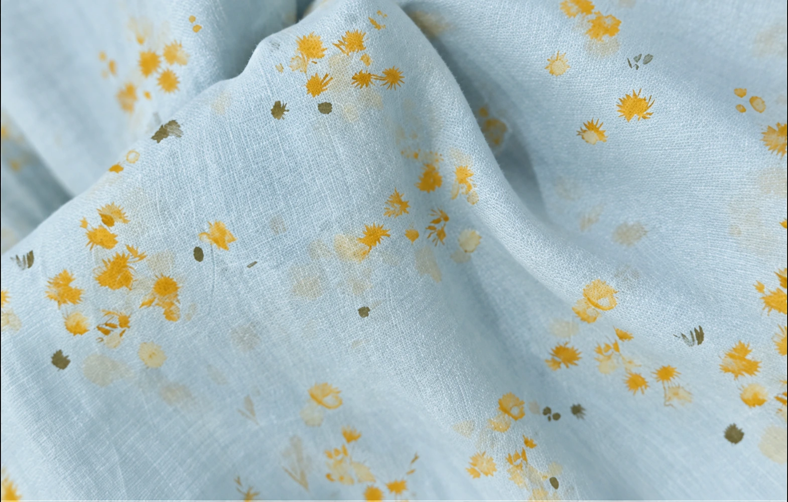 Blue cloth with delicate yellow floral motifs